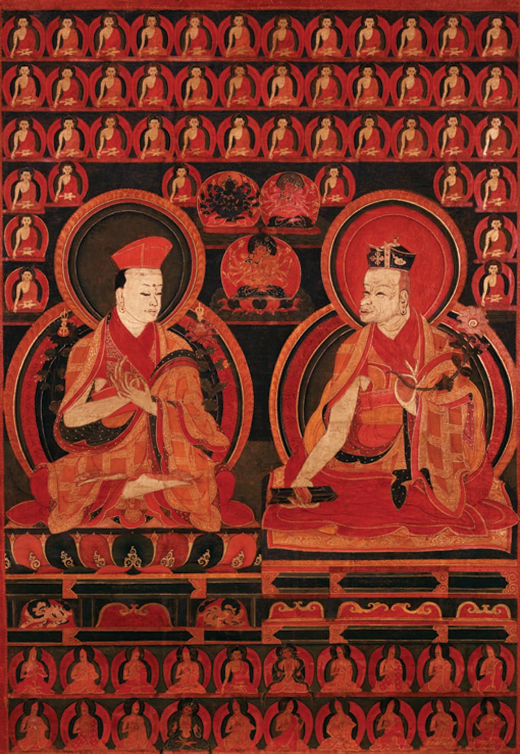 Dans cette thangka du XVIe siècle, Gampopa est représenté avec son disciple de cœur, Dusoum Khyènpa.  Rubin Museum of Art F1997.39.4 (HAR 561).